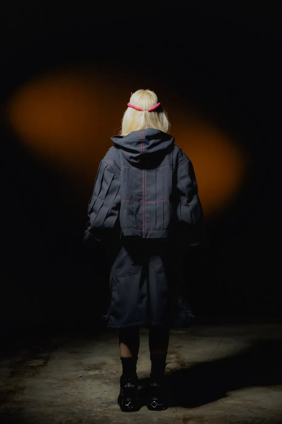APEREIRA studio campaign: Black hooded jacket, seen from the back