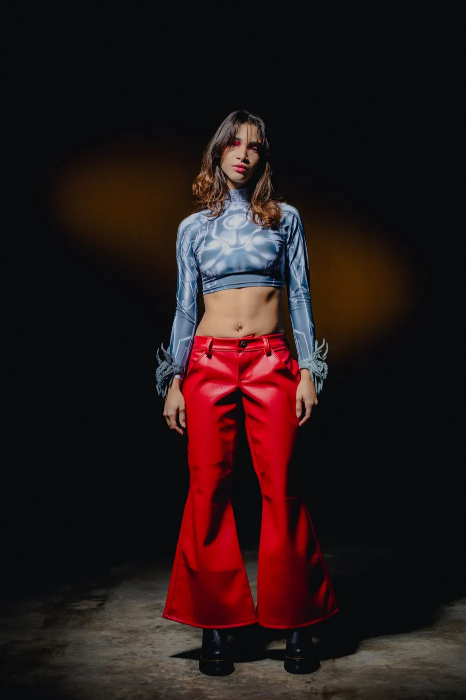 APEREIRA studio campaign: Printed top and red flared pants