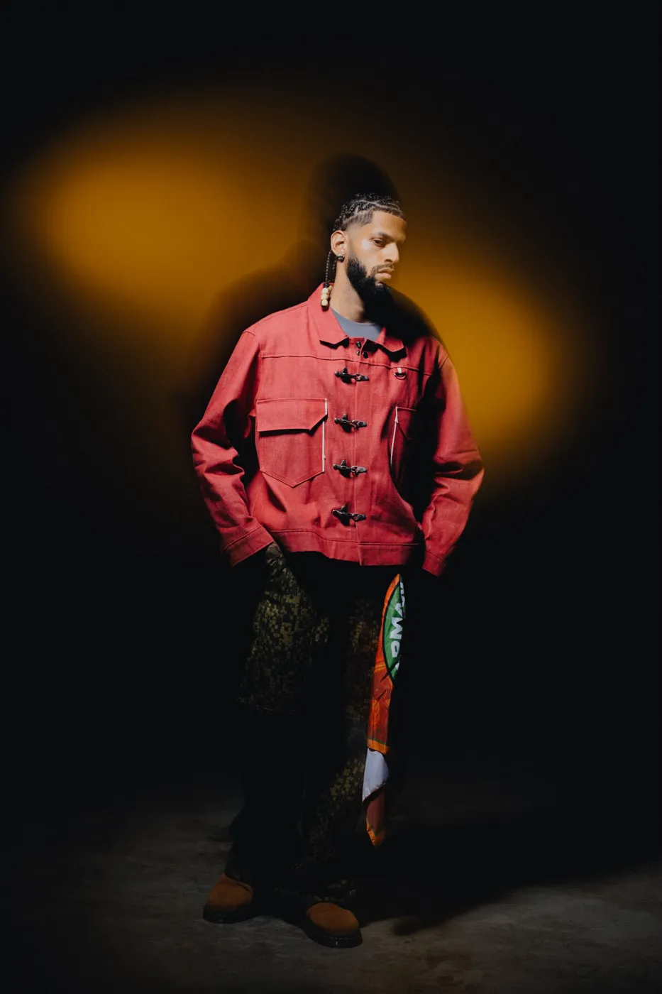 APEREIRA studio campaign: Red jacket with metal clasps